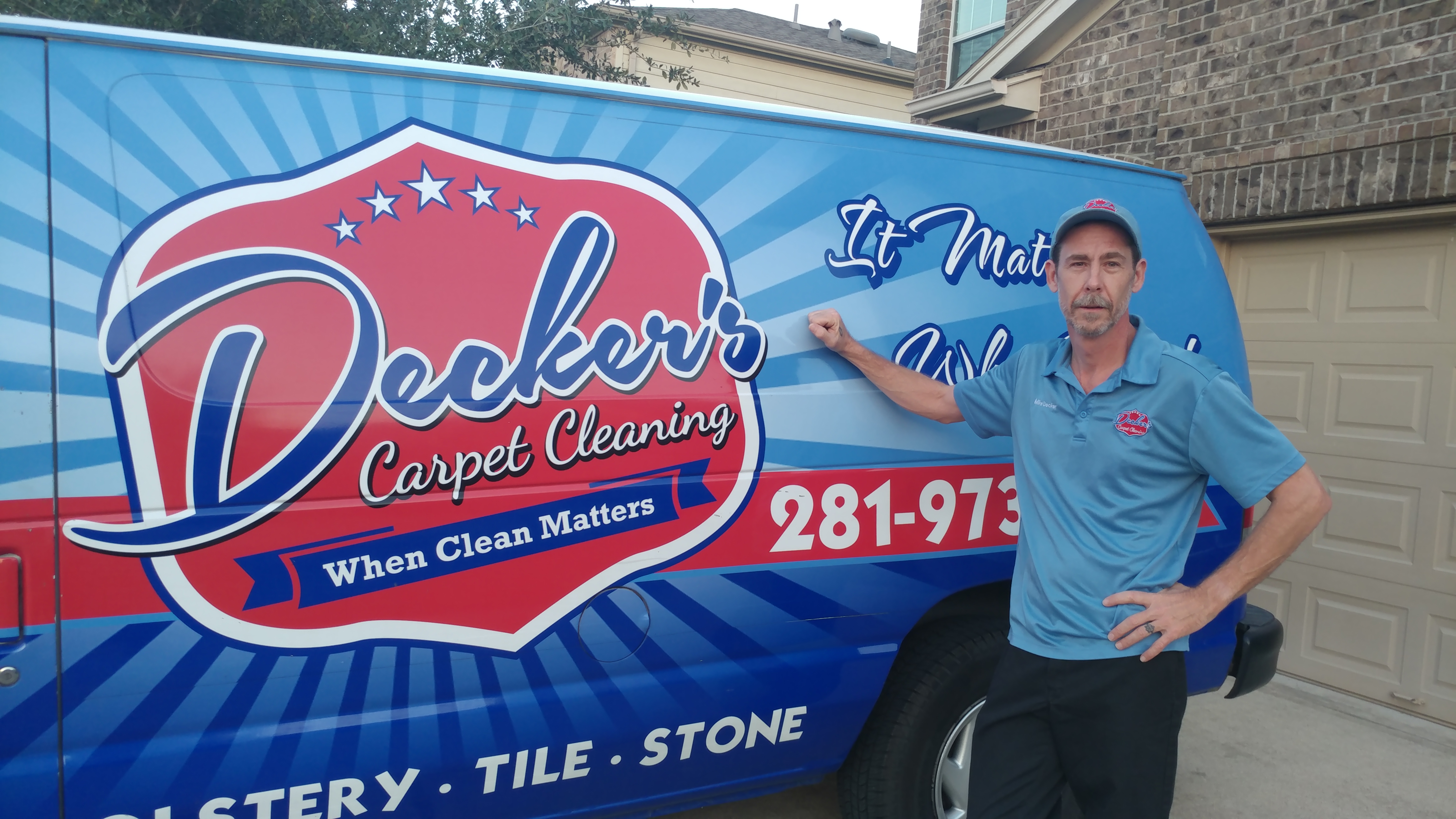 Mike Decker standing with Deckers Carpet Cleaning Van